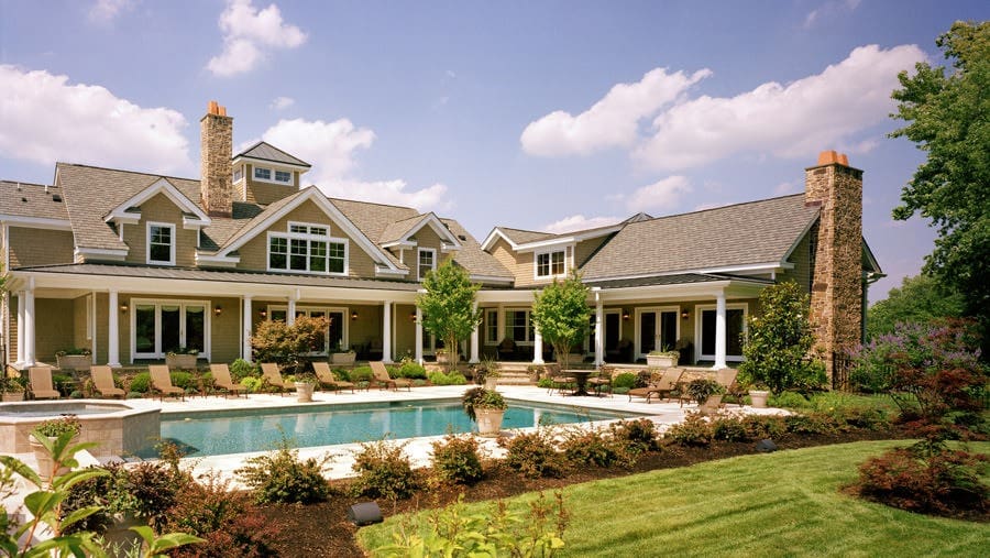 FrontFarmhouseRearExterior Farmhouse rear exterior with pool