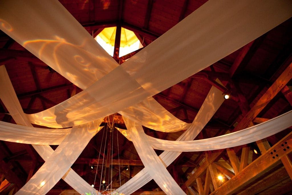 Elegant Farm Wedding at Milldale barn wedding decorated ceiling with cupola