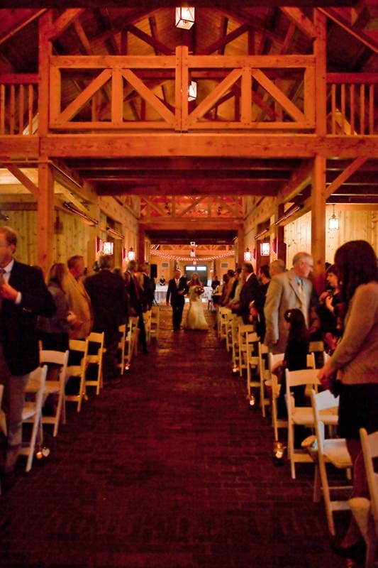 T&H_264 barn wedding bride walking down aisle