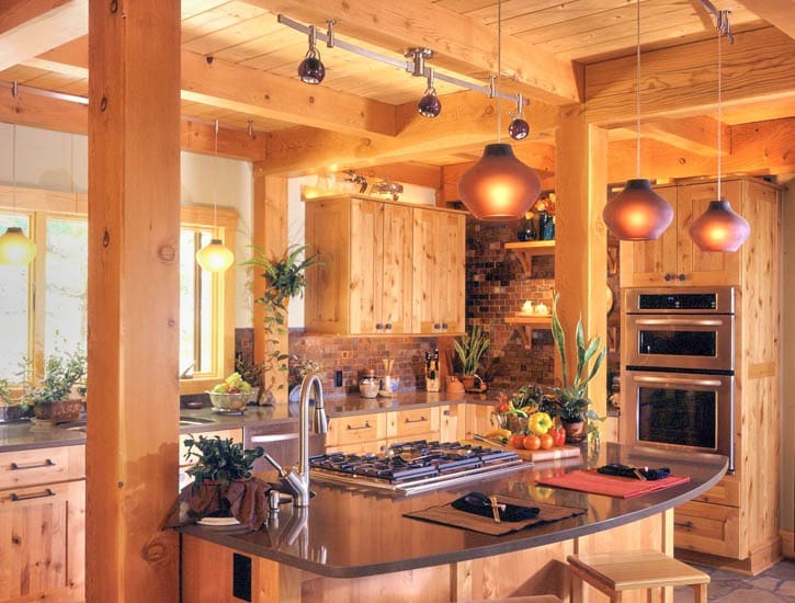6049-AwesomeLighting post and beam kitchen with orange glass pendant lights
