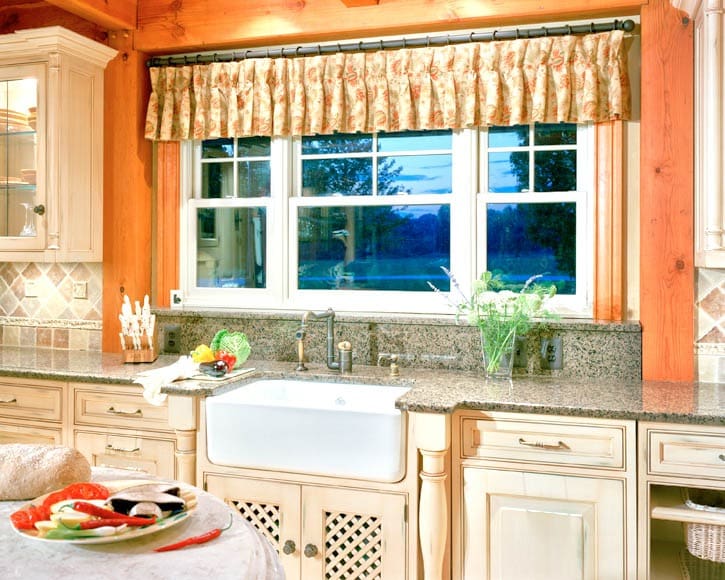 FarmSink post and beam kitchen with farm sink