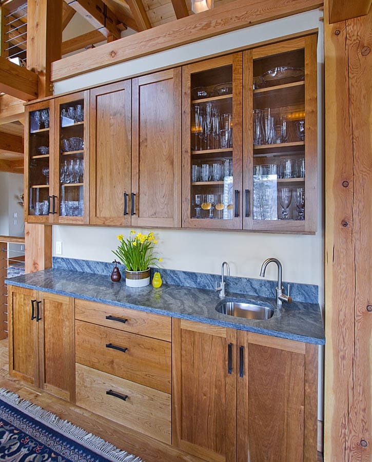 GreatCountertops post and beam kitchen with soapstone couter tops