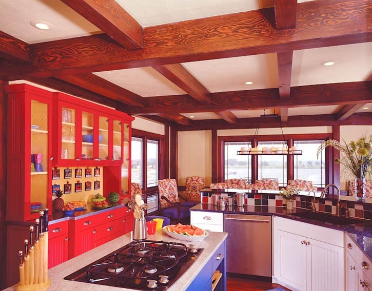 MultiTonedCabinets post and beam kitchen with multi colored cabinets